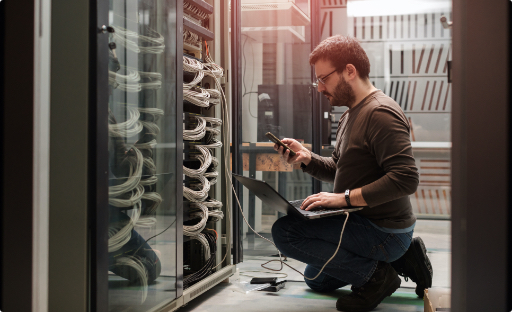 Wan Dynamics professional working in server room